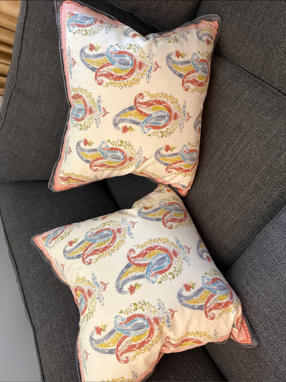 Decorative Paisley Throw Pillow Pair in Cream with Coral, Blue, and Yellow